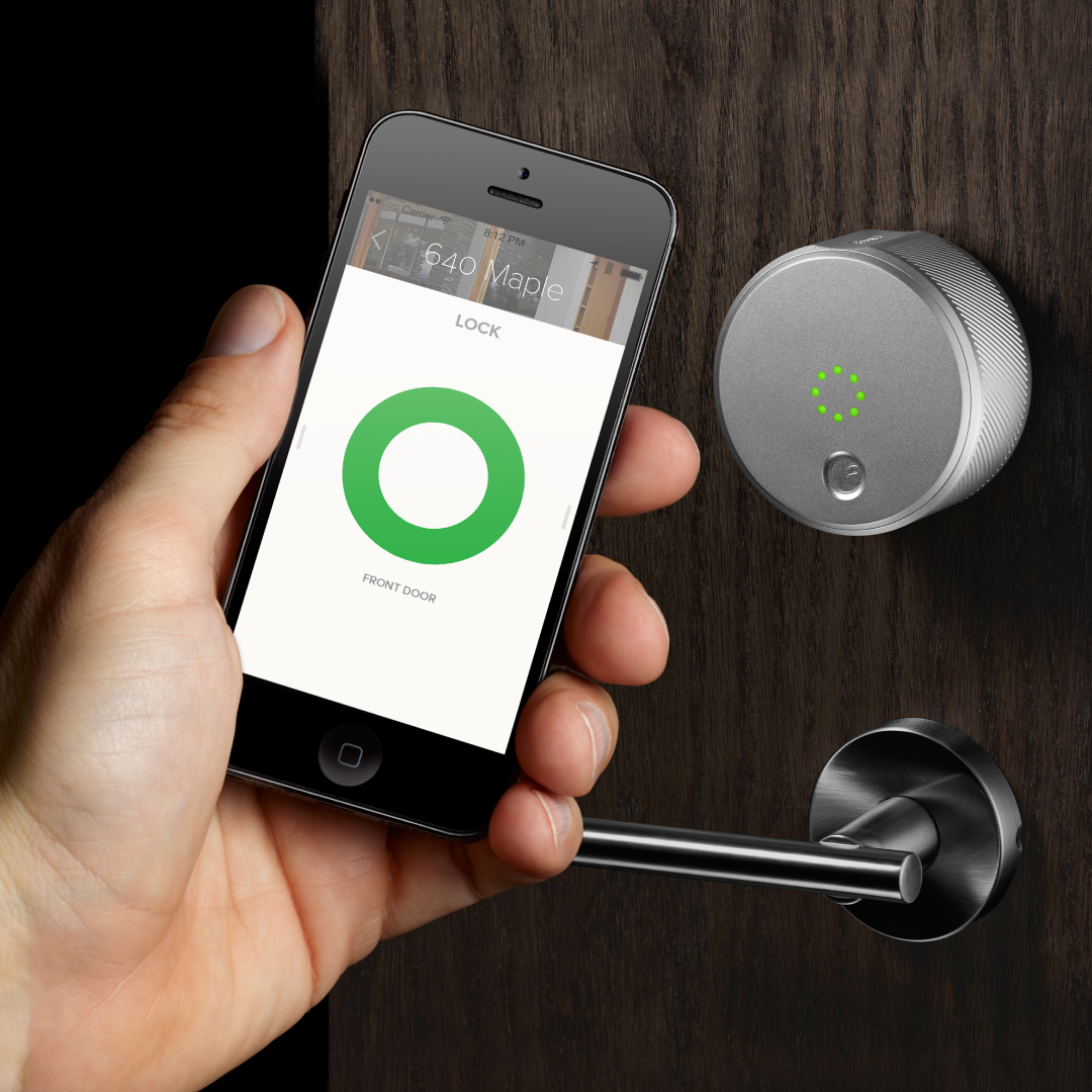 Hand holding smartphone with digital lock interface and key icon
