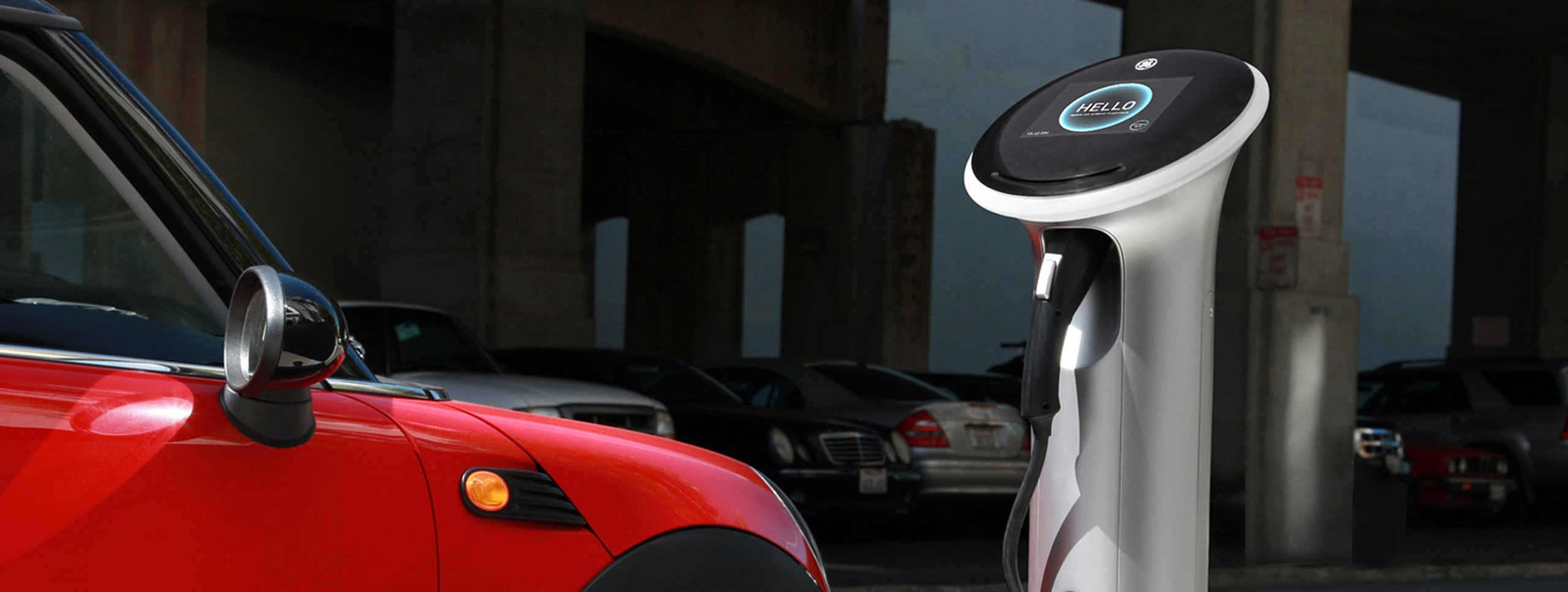 GE WattStation charging a red electric car