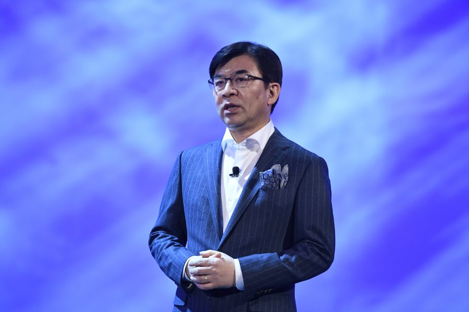 Hyun-Suk Kim speaking at event