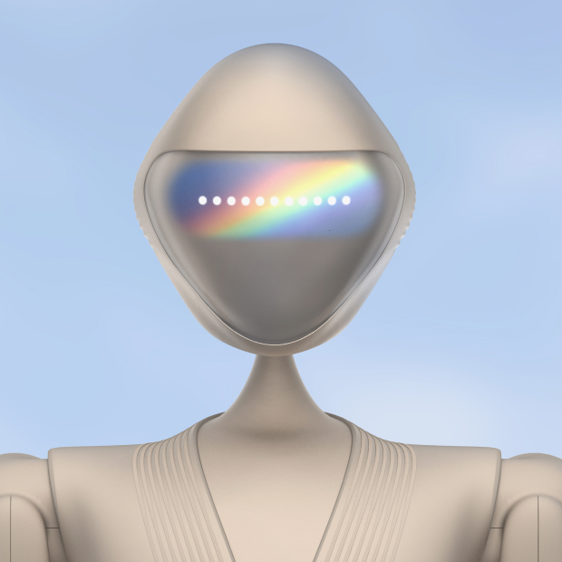 Kindred humanoid robot concept with beige body and visor displaying a rainbow-toned eye graphic.