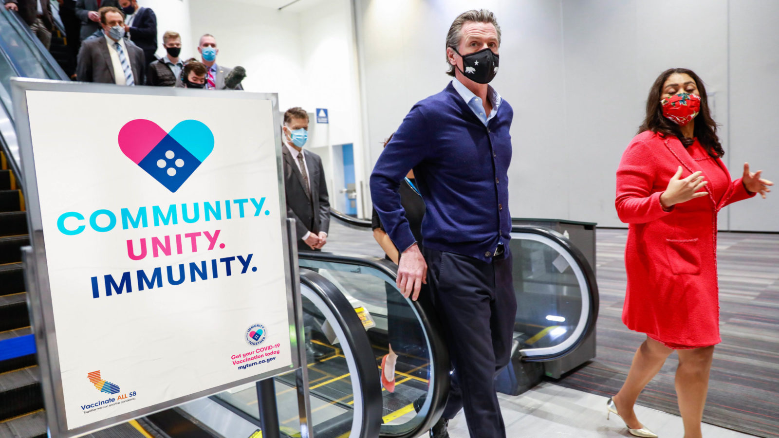 Community vaccination outreach with masked workers