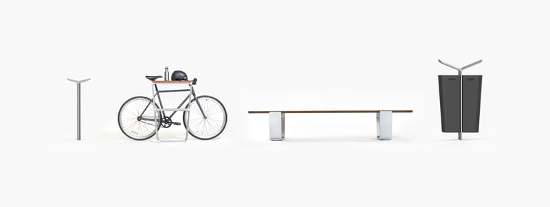 Black bicycle with blue seat parked next to a wooden bench and trash can