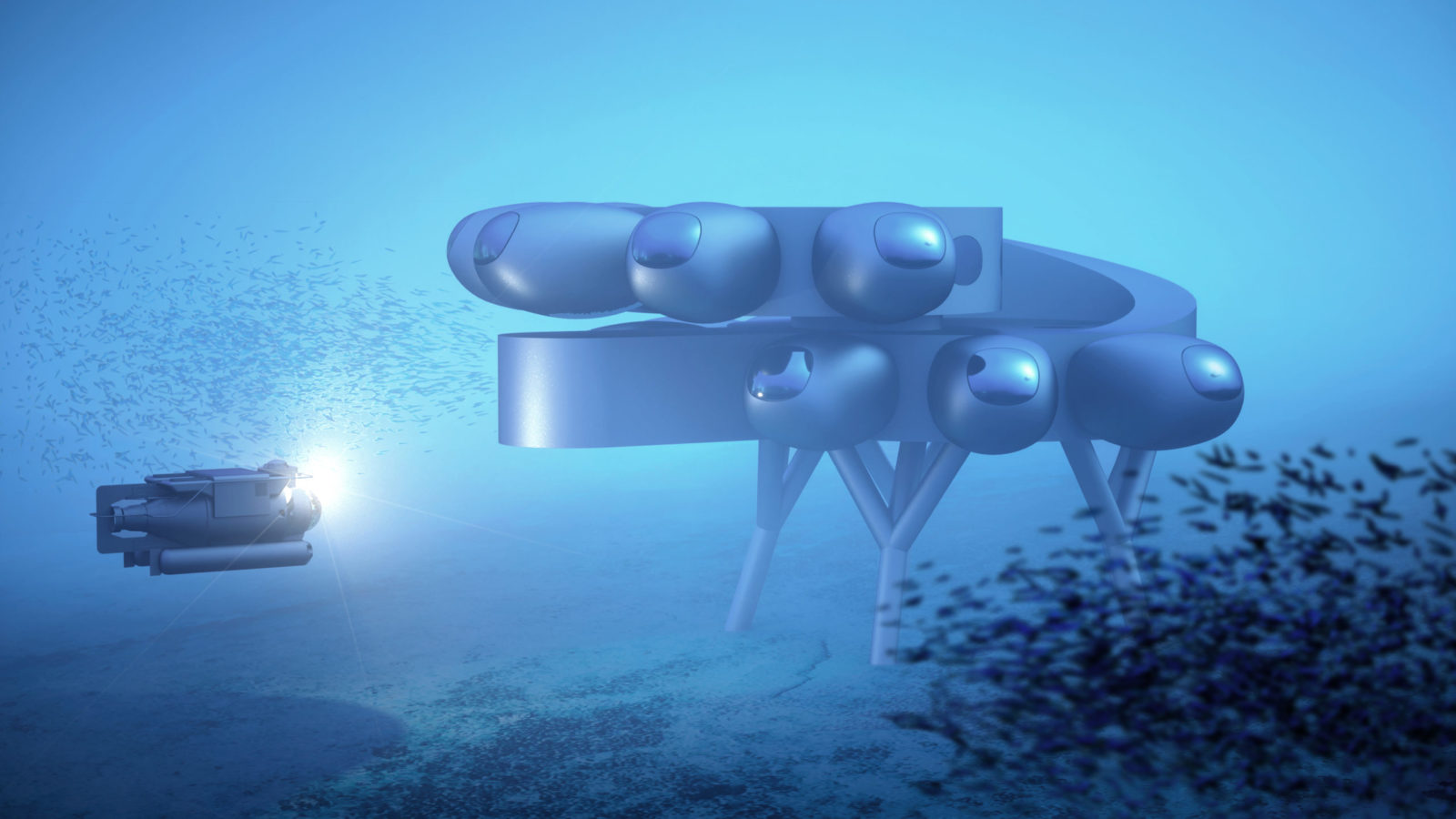 Concept rendering of the Proteus underwater habitat illuminated at night, with a submersible approaching the modular station