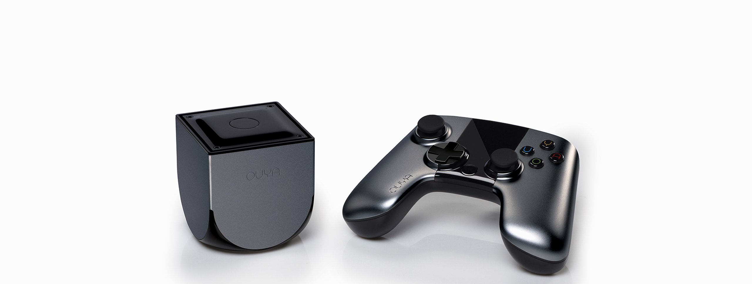 Ouya black game controller and smartphone