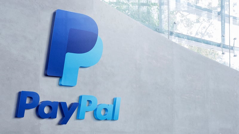 PayPal logo with stylized 'P' and red dot on gray background