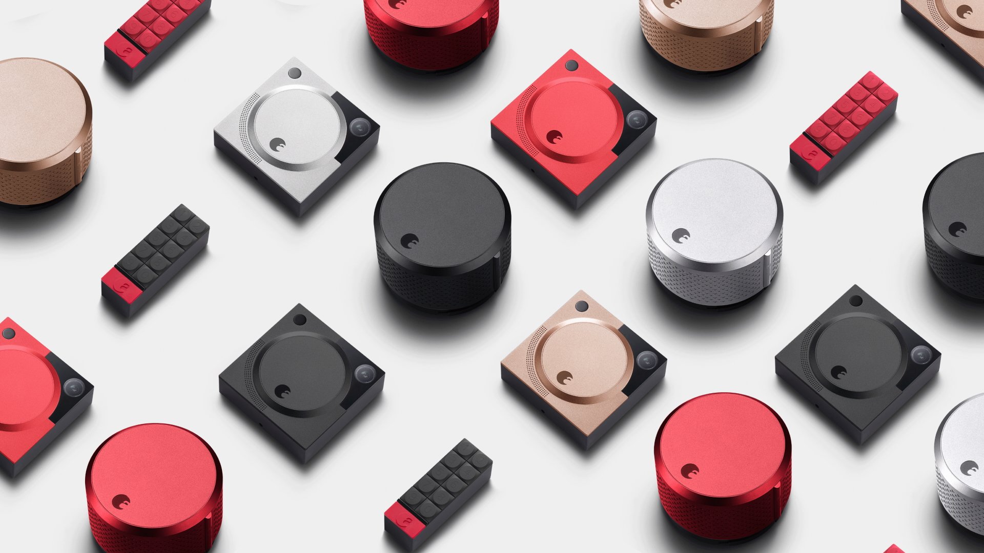 Red and black electronic components or game pieces on a white background