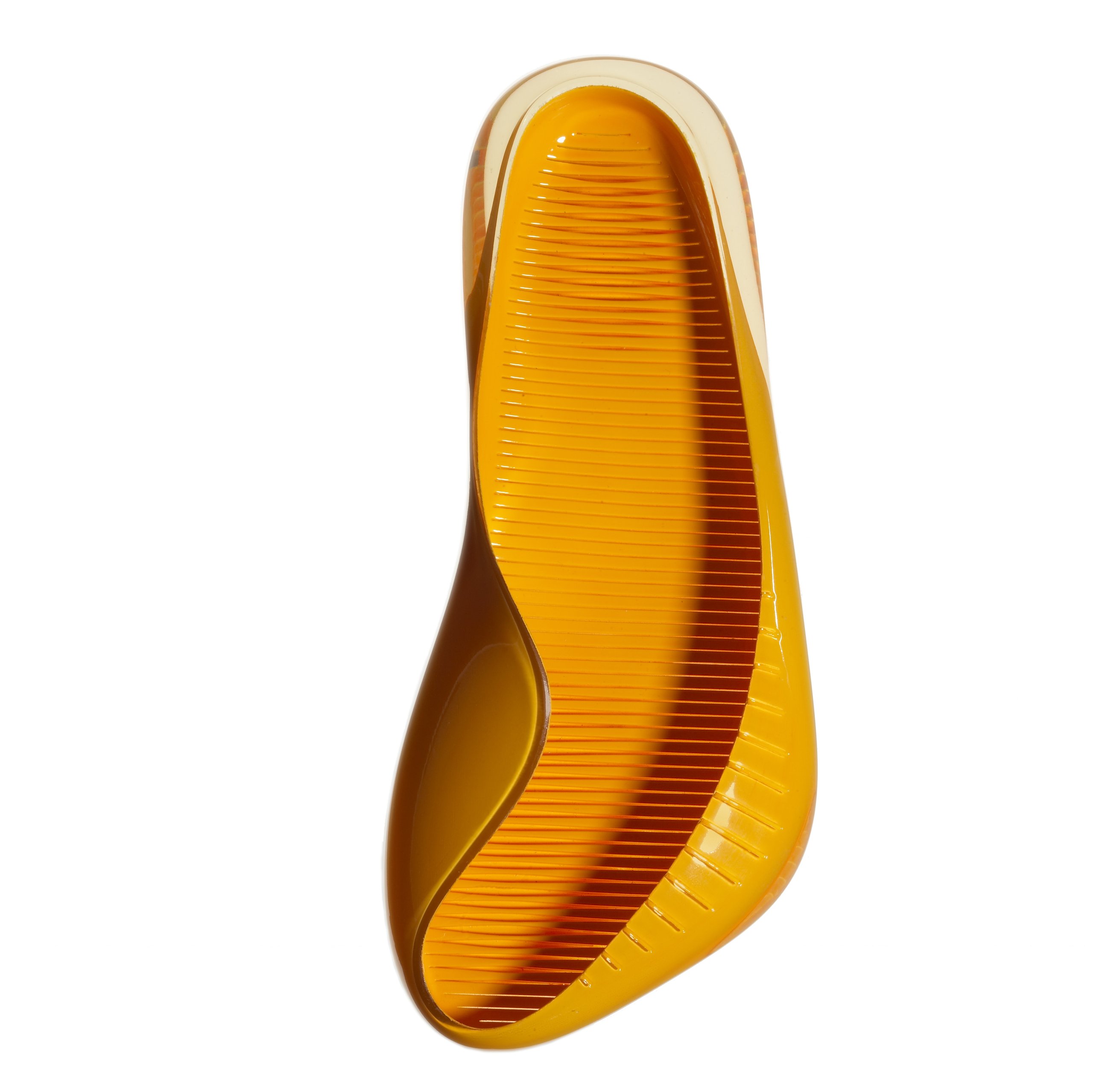 Yellow sandal with contoured sole and raised toe on a white background