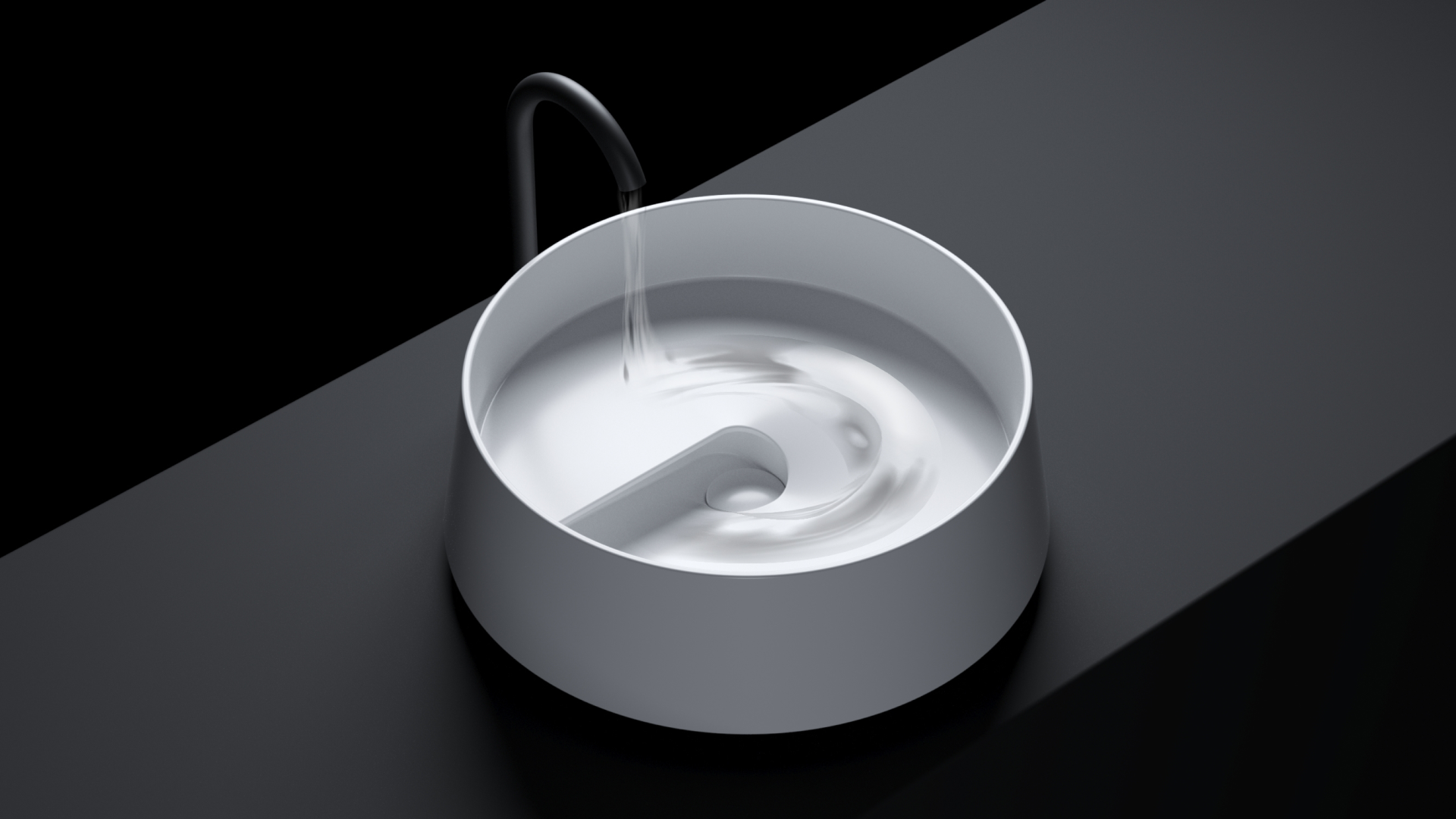 Silver pot with handle and spout on a black surface