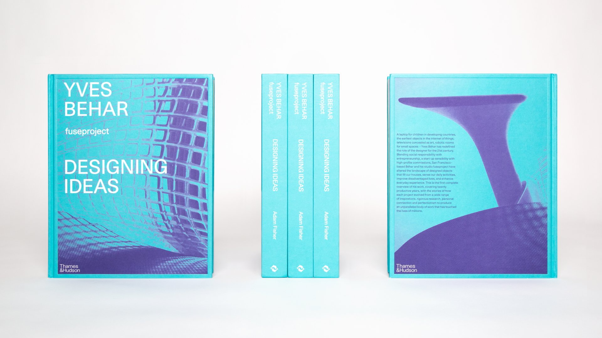 Blue books with white text and abstract designs on a flat surface