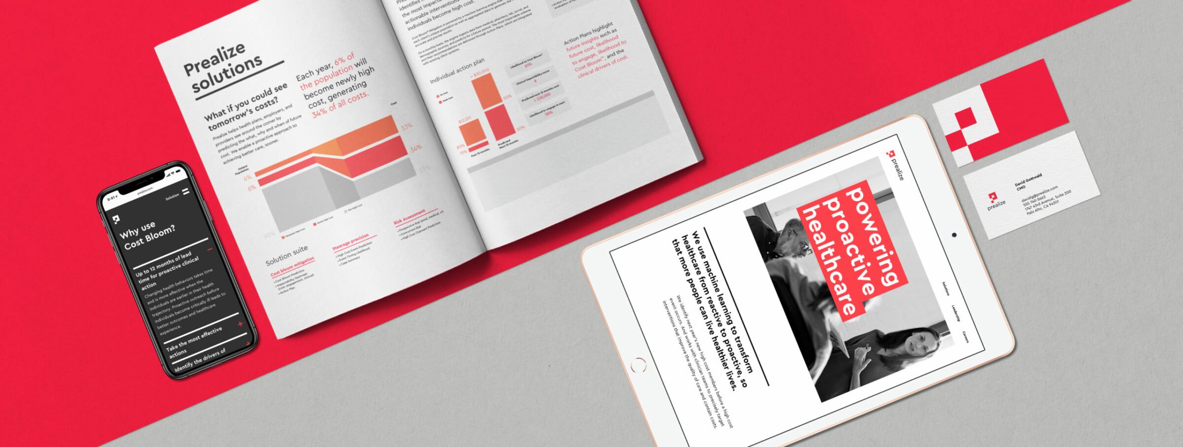 Open booklet with multiple pages on a red surface