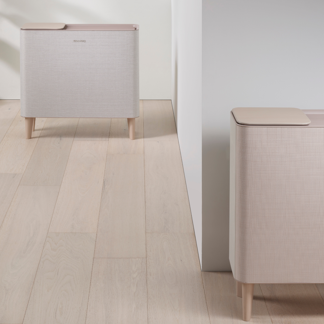 Coway speaker icon with woven texture and light wood finish