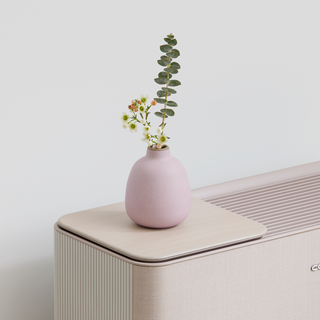 Coway Icon air purifier with pink vase styling