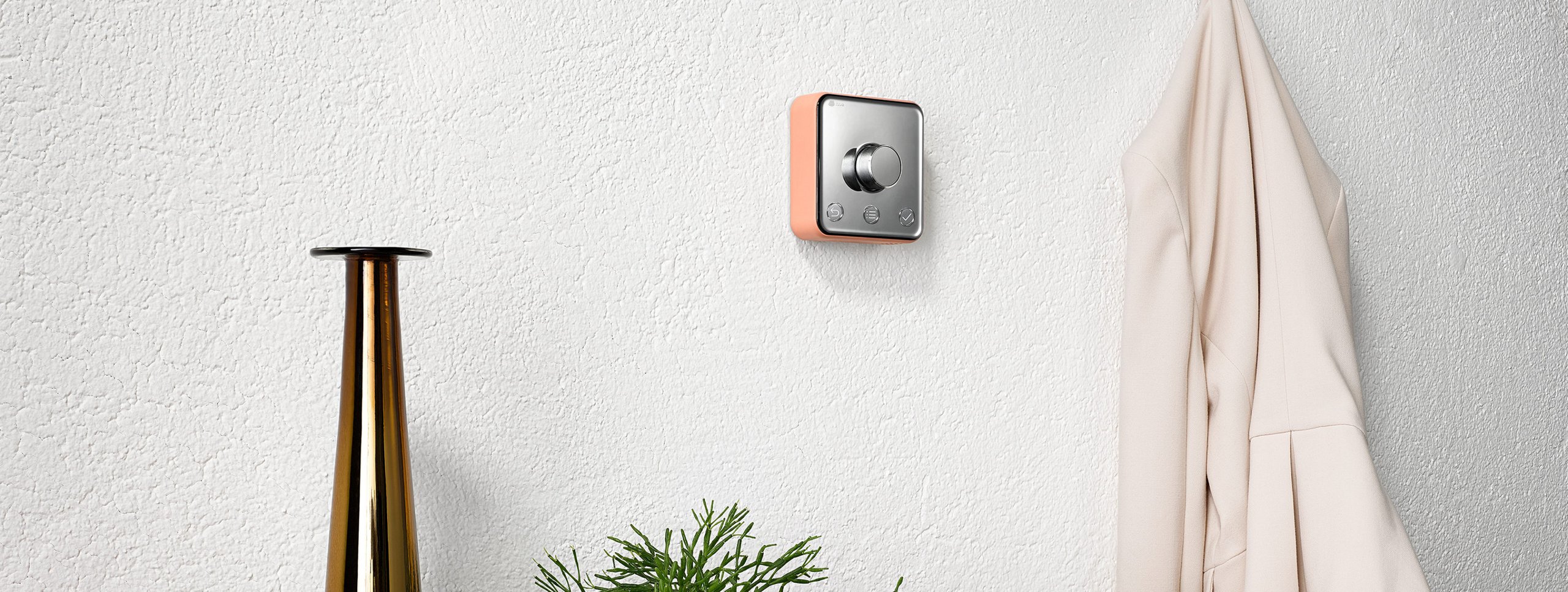 Hive Active Heating smart thermostat on white wall