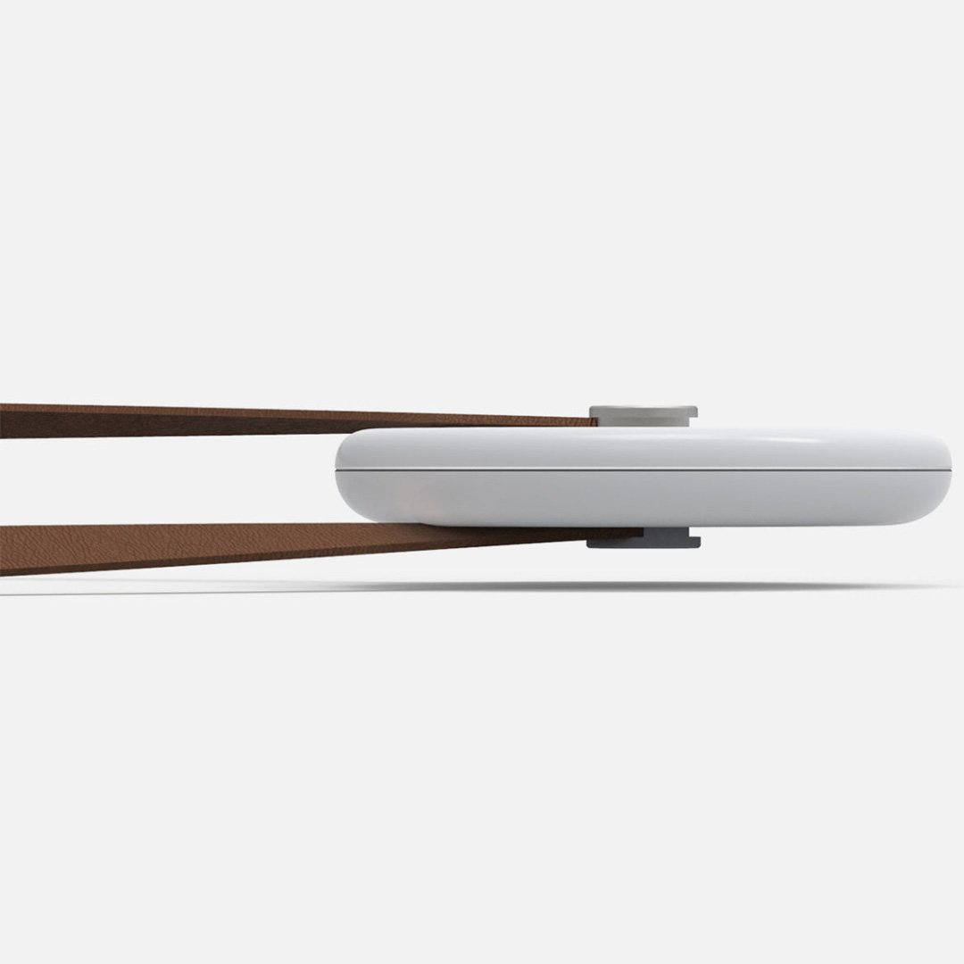 Kernel project tool with white body, brown handle, and silver hinge on neutral background