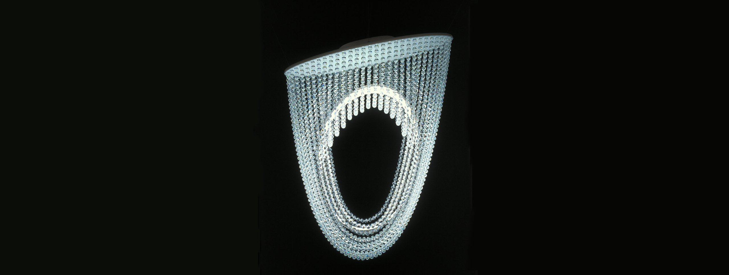 Small, rectangular product with shiny metal or plastic surface