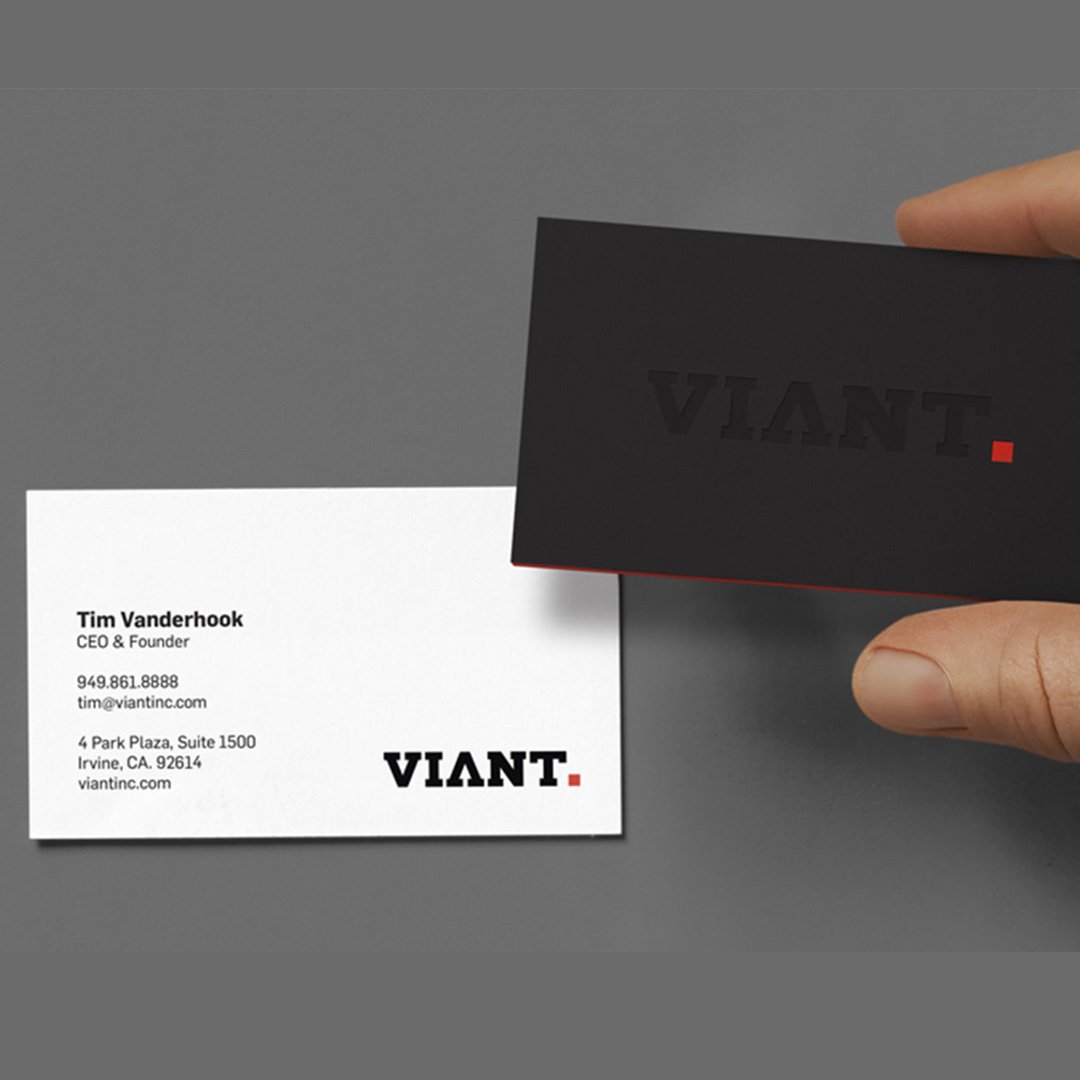 Viant business card on dark surface