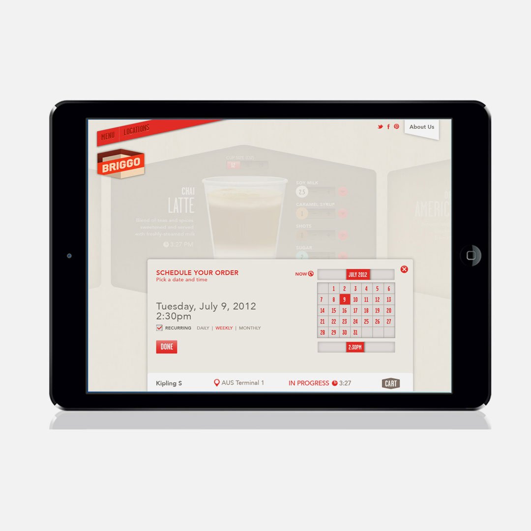 Restaurant event schedule on a tablet screen with blurred coffee cup background