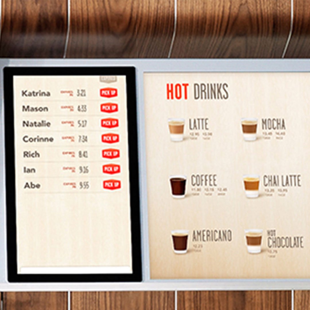 Menu board with hot and cold drinks listed on a wooden surface