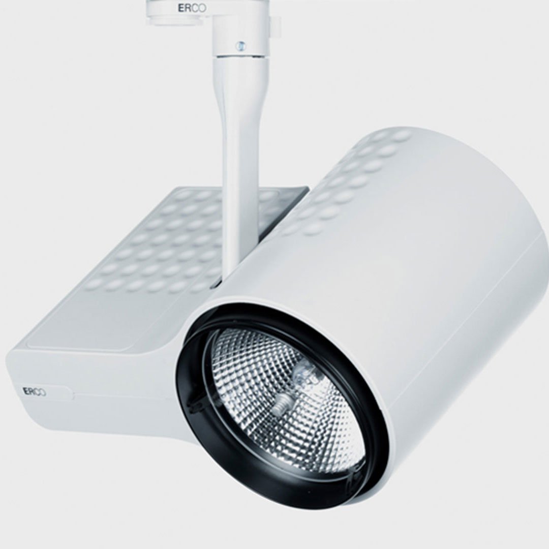 White projector with two lenses and a spotlight on a grid-patterned platform