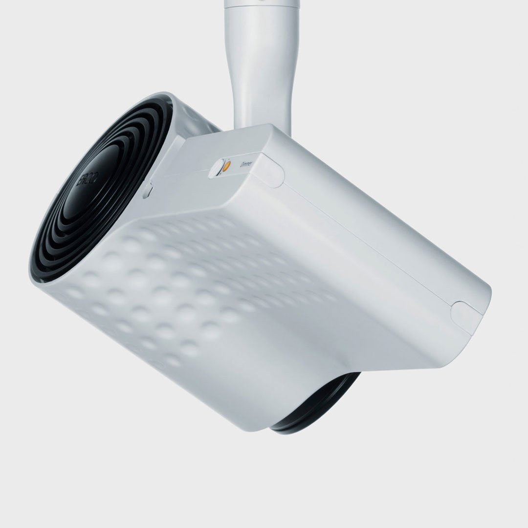 erco white ceiling-mounted projector luminaire with sleek cylindrical design