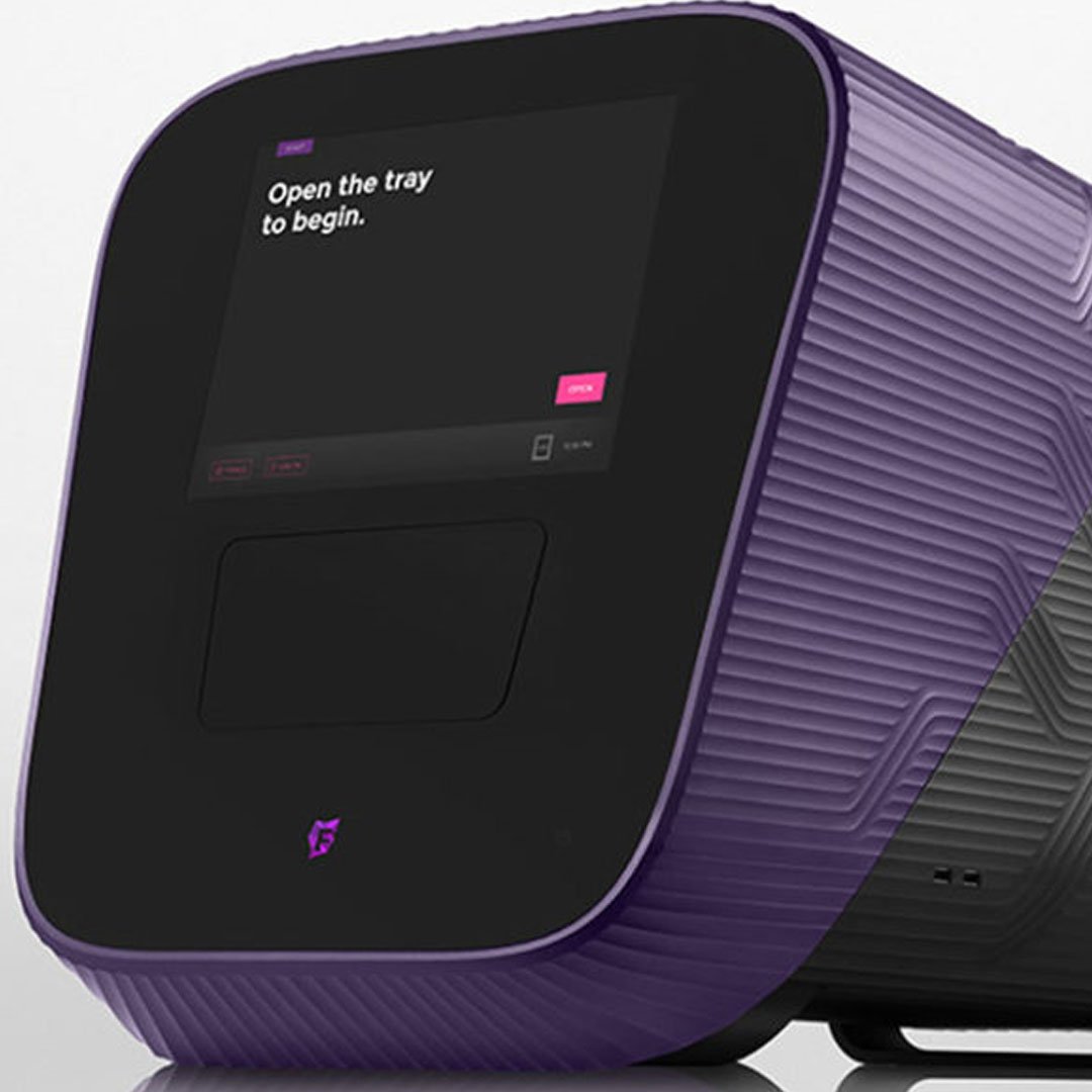 Fluidigm purple and black printer and scanner devices compared on white background