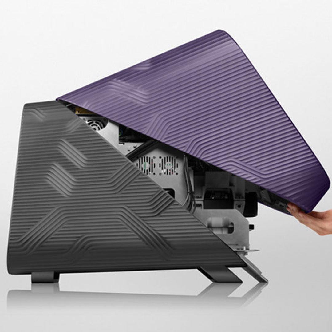 Fluidigm purple laptop opened to reveal internal components beside portable storage device