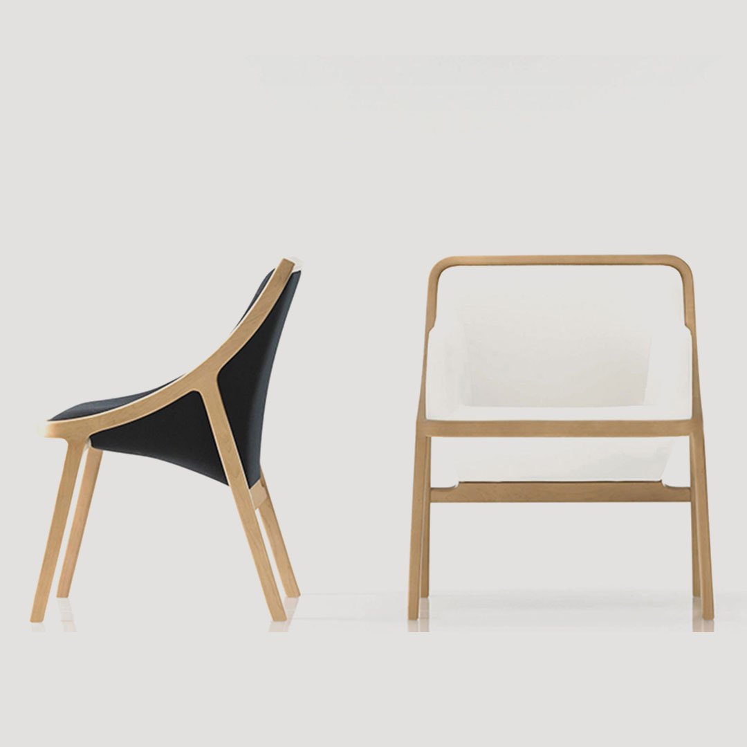 HBF trio of minimalist chairs in three different wood tone finishes against a white backdrop
