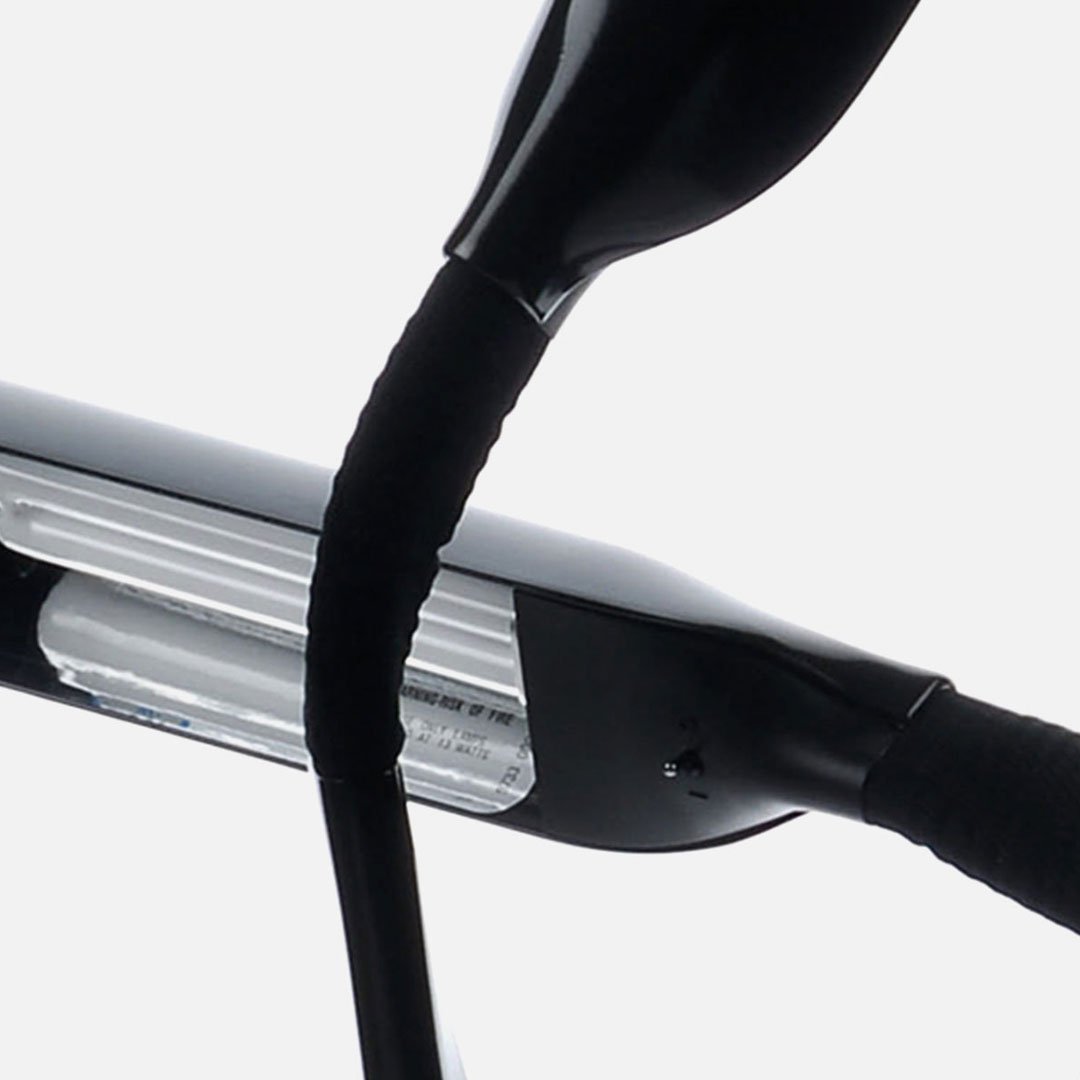 Herman Miller Leaf Lamp concept shown as a black bicycle seat with white 100% waterproof label
