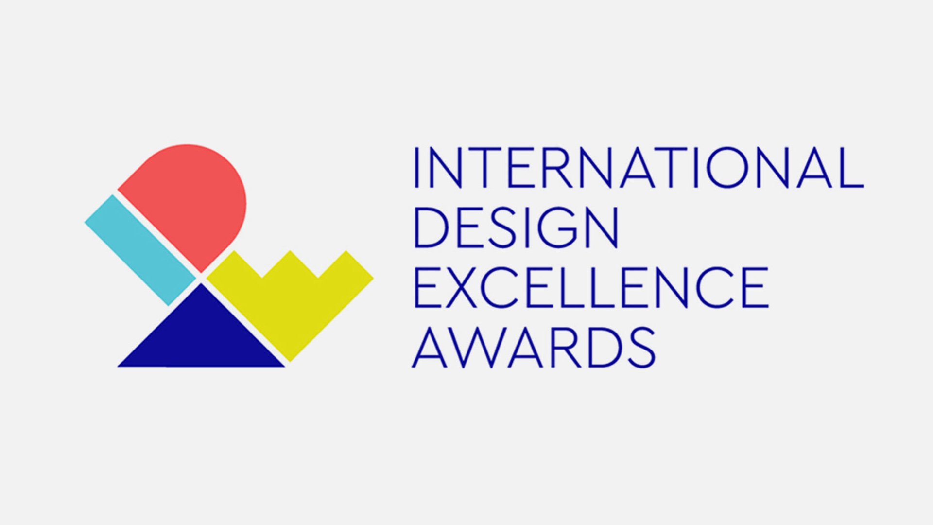 Red, white, and blue logo with 'INTERNATIONAL DESIGN EXCELLENCE AWARDS' and 'DESIGN AWARDS' text