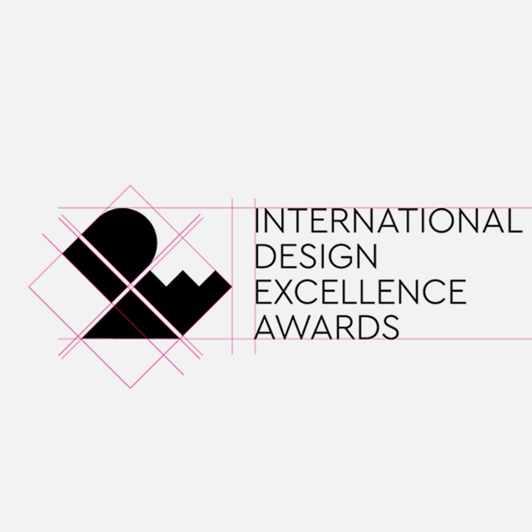 IDSA International Design Excellence Awards (IDEA) logo with stylized black D and pink geometric border