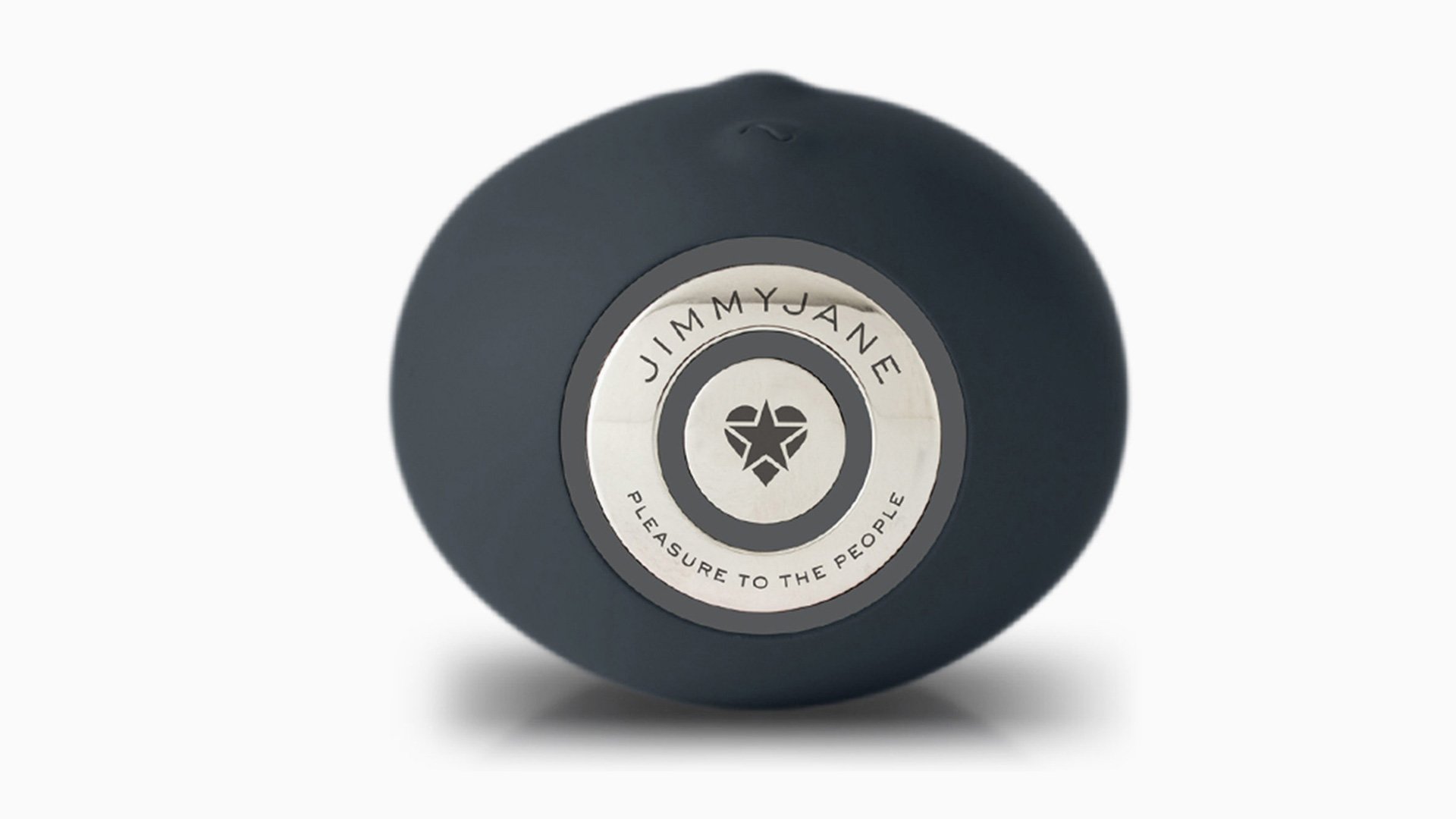 Dark blue circular object with white logo and 'CANDLE' text