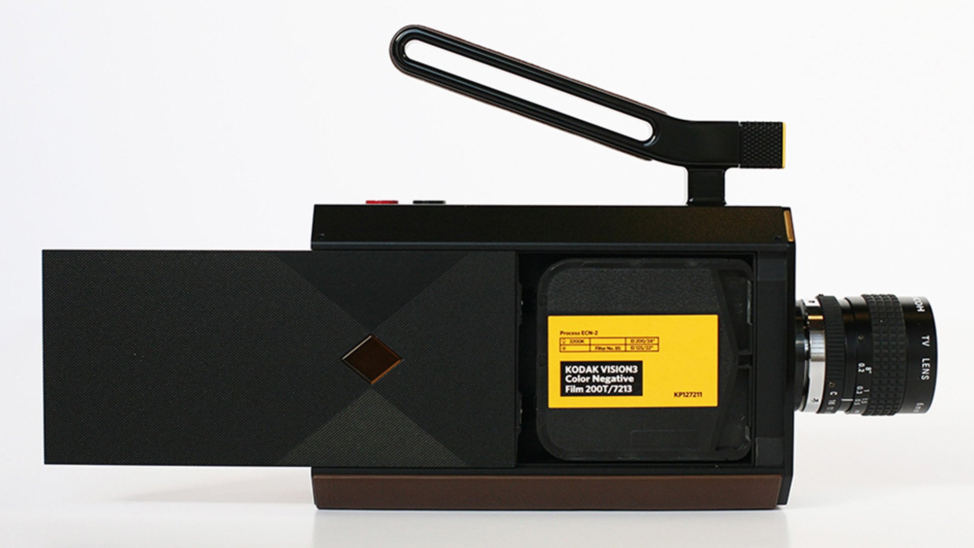 Old-fashioned film camera with black body and yellow label