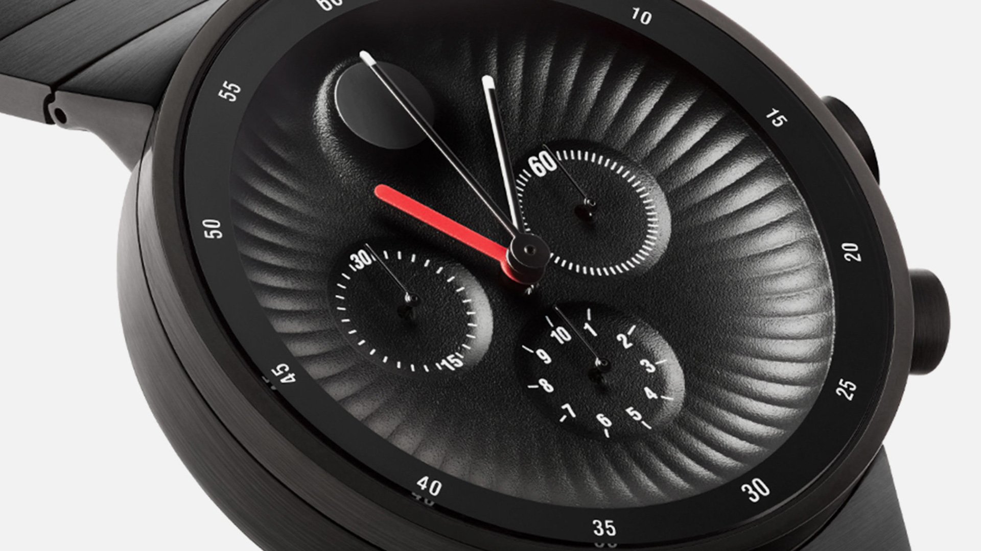 Movado Edge smartwatch with black strap and digital display showing time and fitness metrics on white background