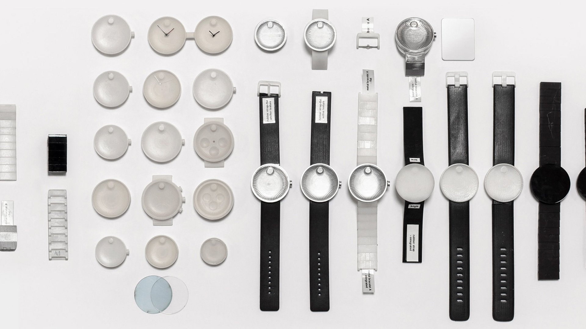 Movado Edge collection of watches and component parts arranged on a white background