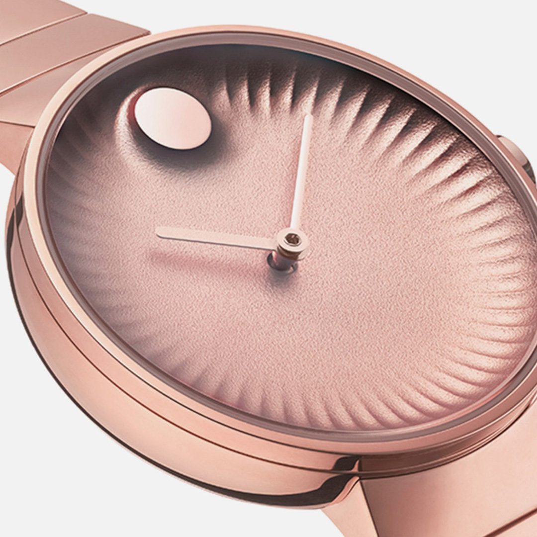 Movado Edge rose gold watch with circular dial face and moon phase indicator close-up