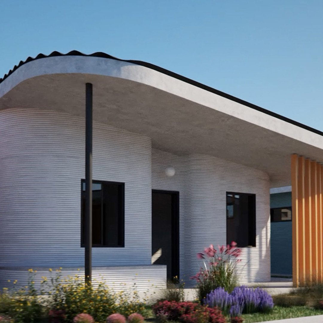 New Story 3D-printed concrete home with curved layered walls, dark accent posts, wooden slatted entry and wildflower garden u
