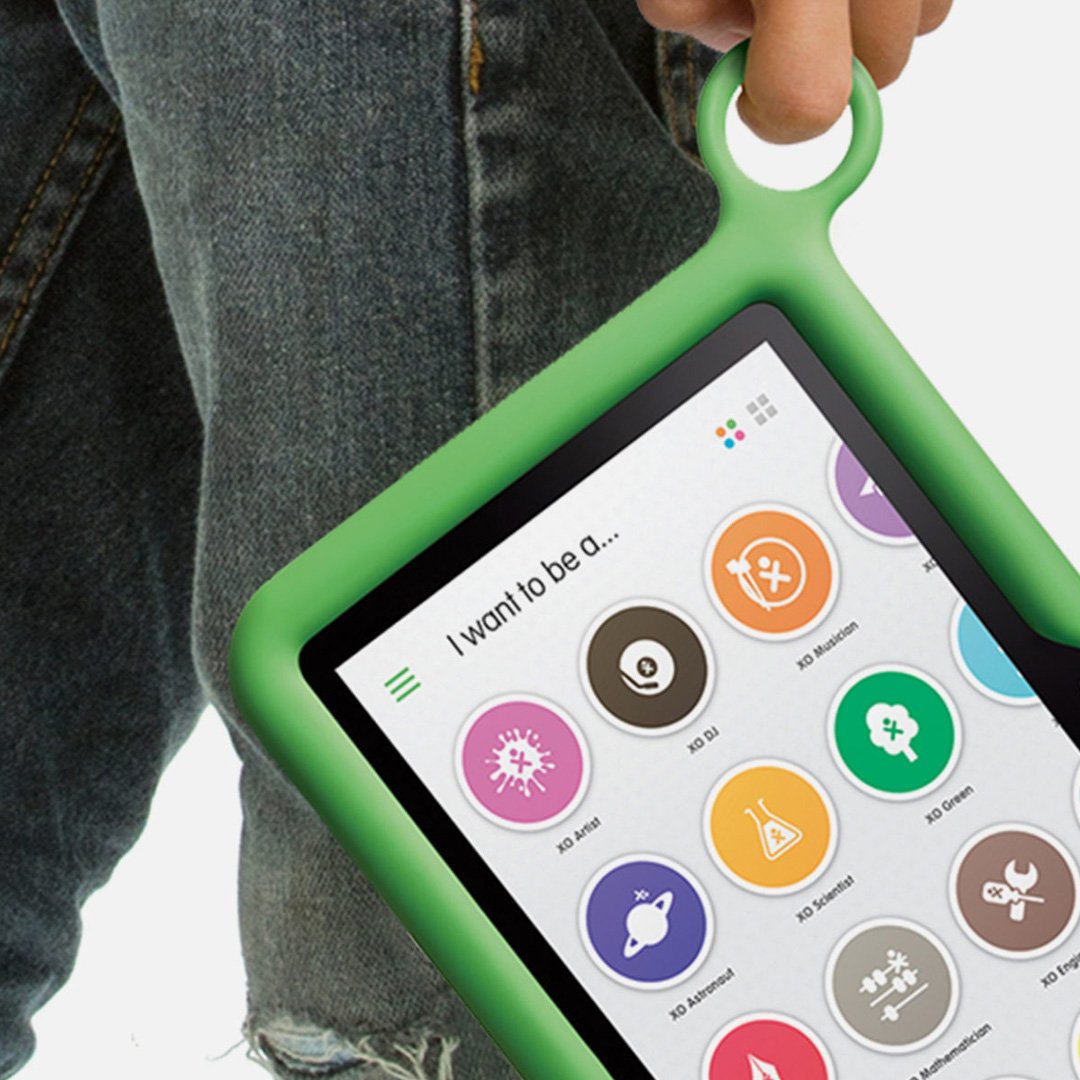 OLPC XO Tablet in green case held by a person displaying colorful app icons interface