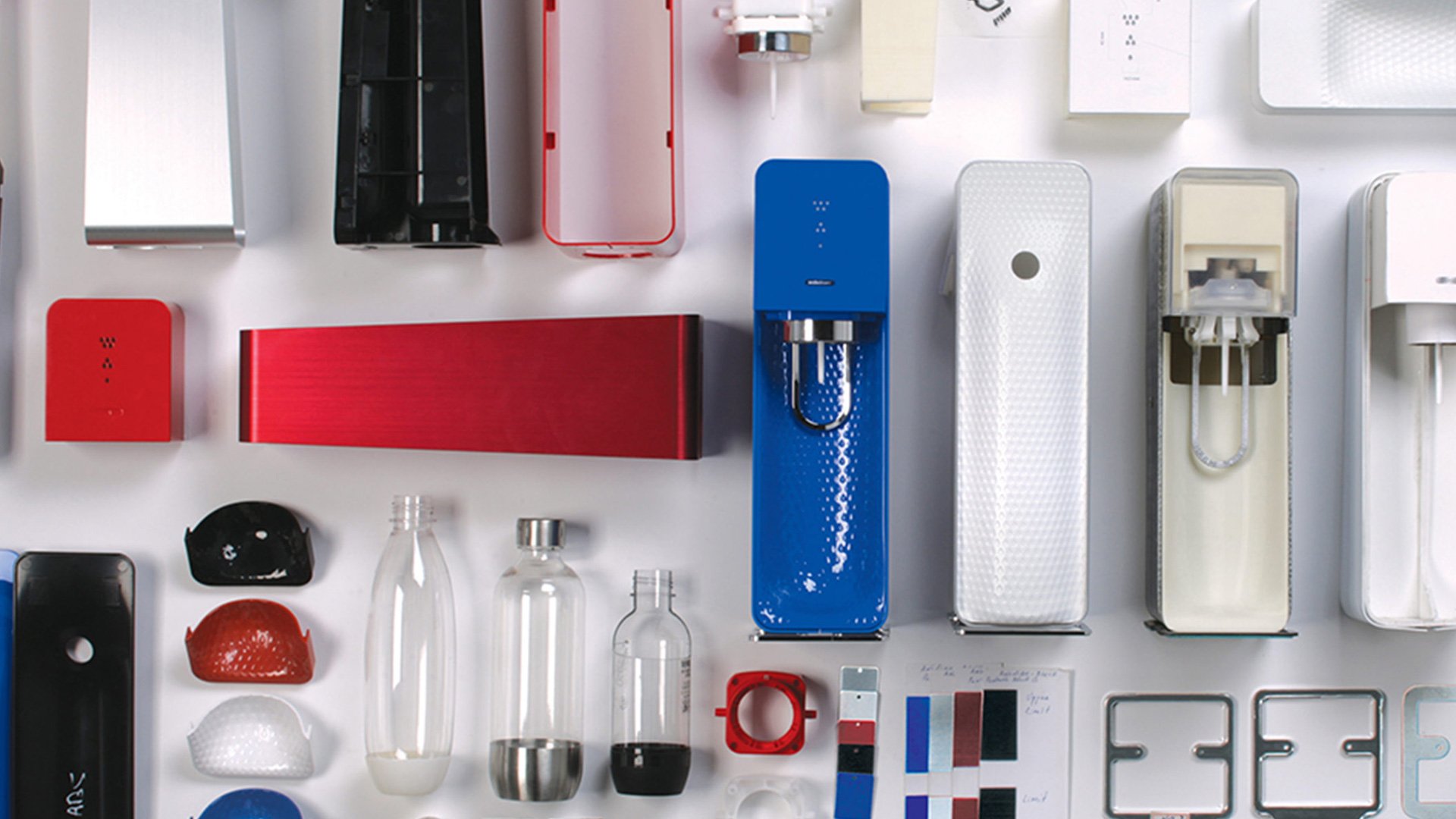 Red and silver vaping products on a white background