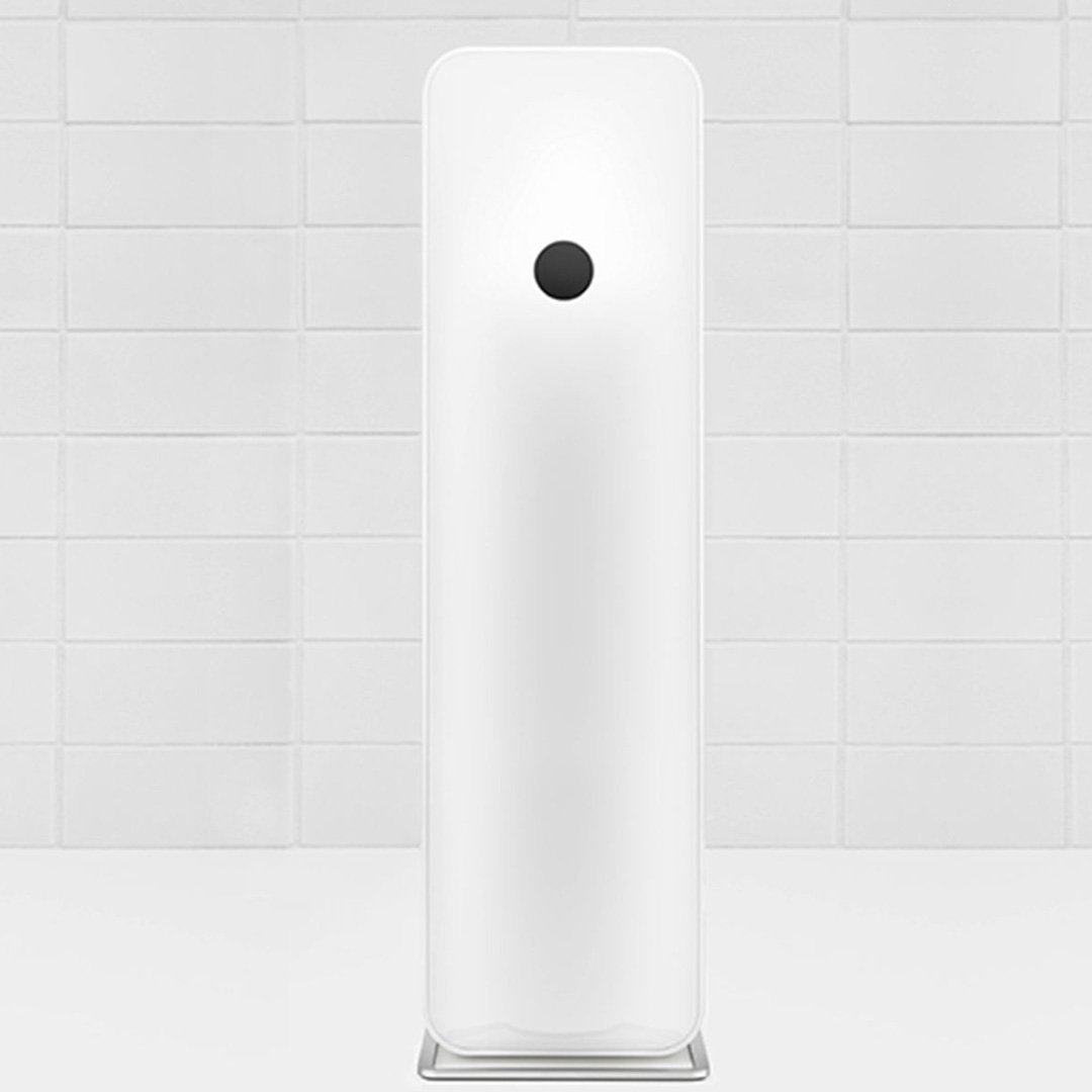 White diffuser with black circular opening on a tiled floor
