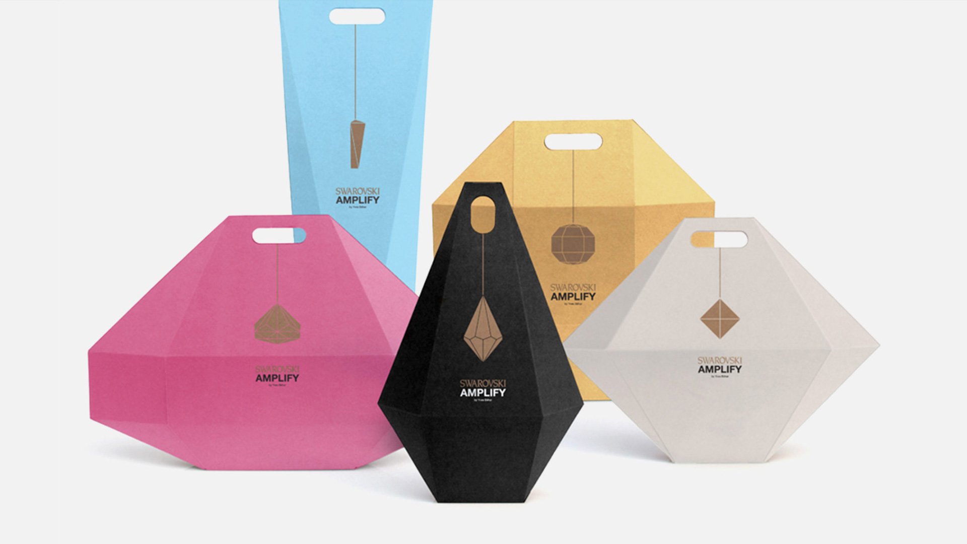 Three colored boxes on a white background with unique designs