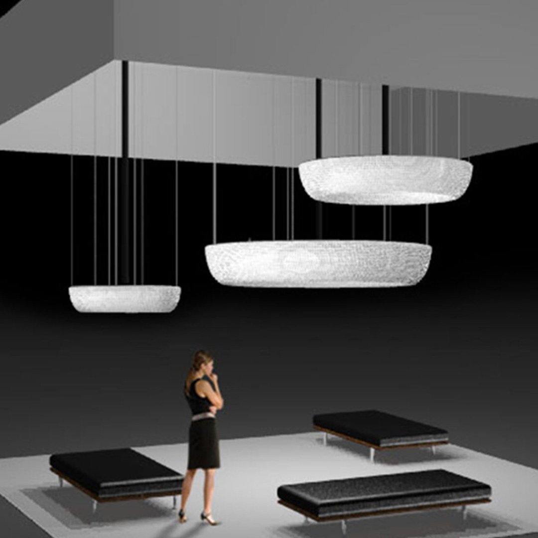 Woman stands in modern room with spherical lights and wooden furniture