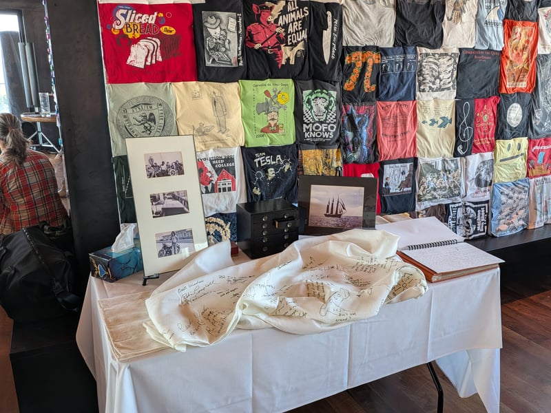 Artifact table and t-shirt wall