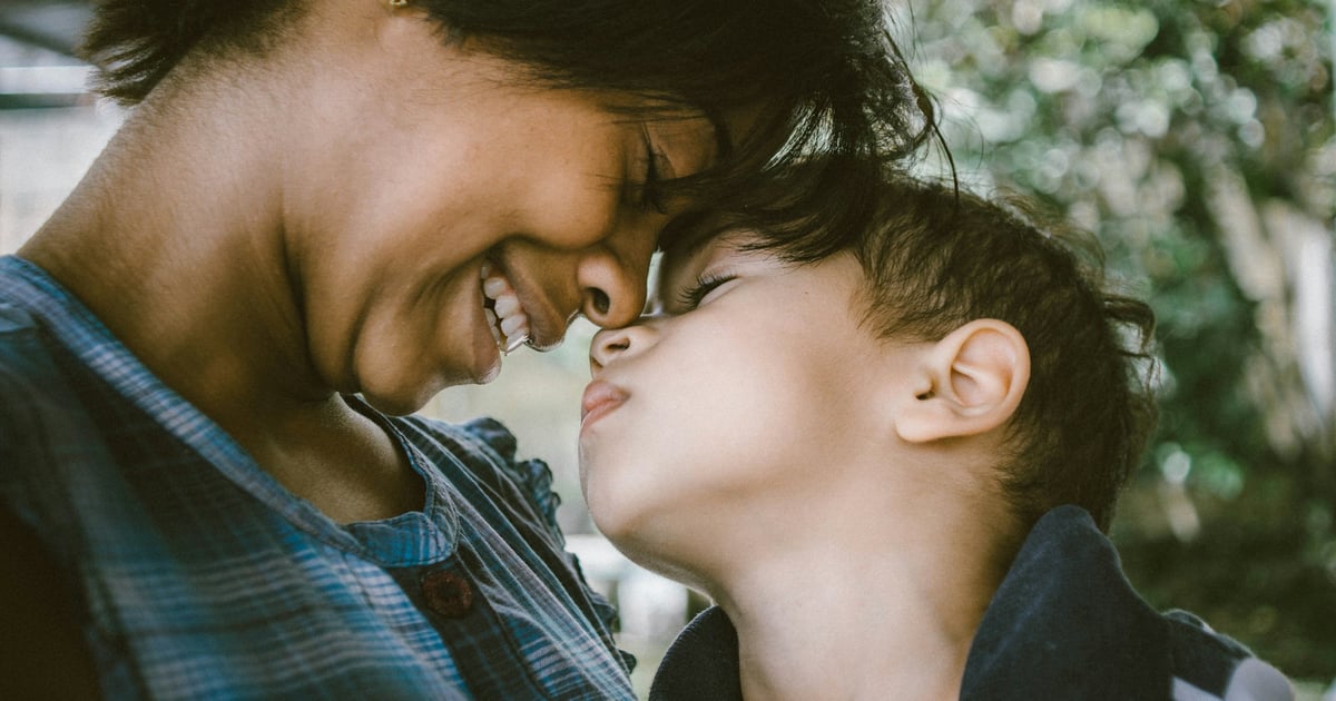 selective focus photography of woman and boy