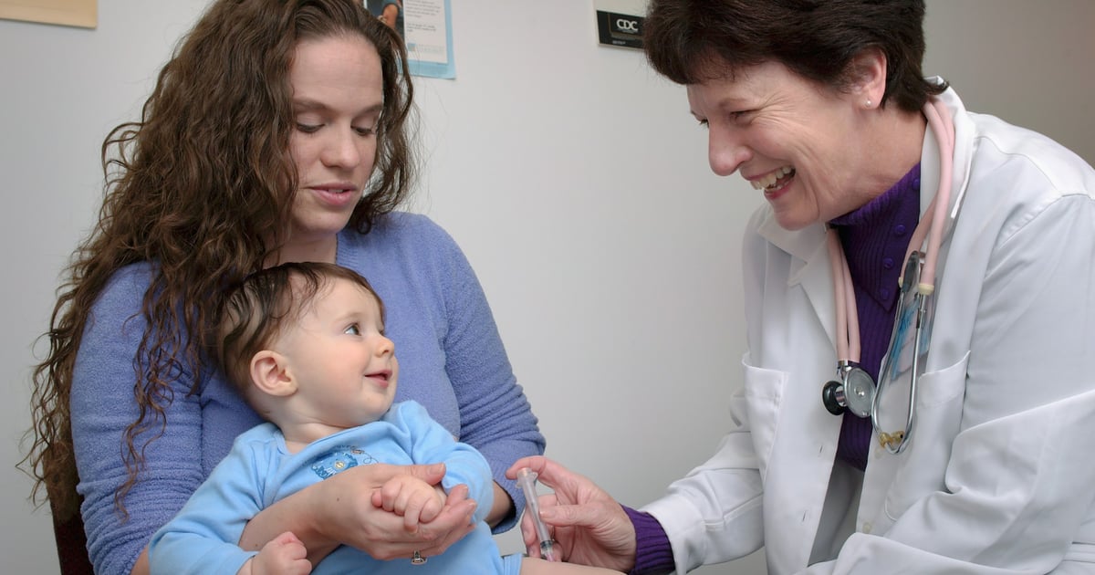 a young child is being examined by a doctor
