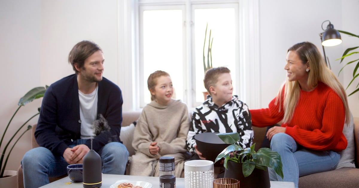 a group of people sitting around a table