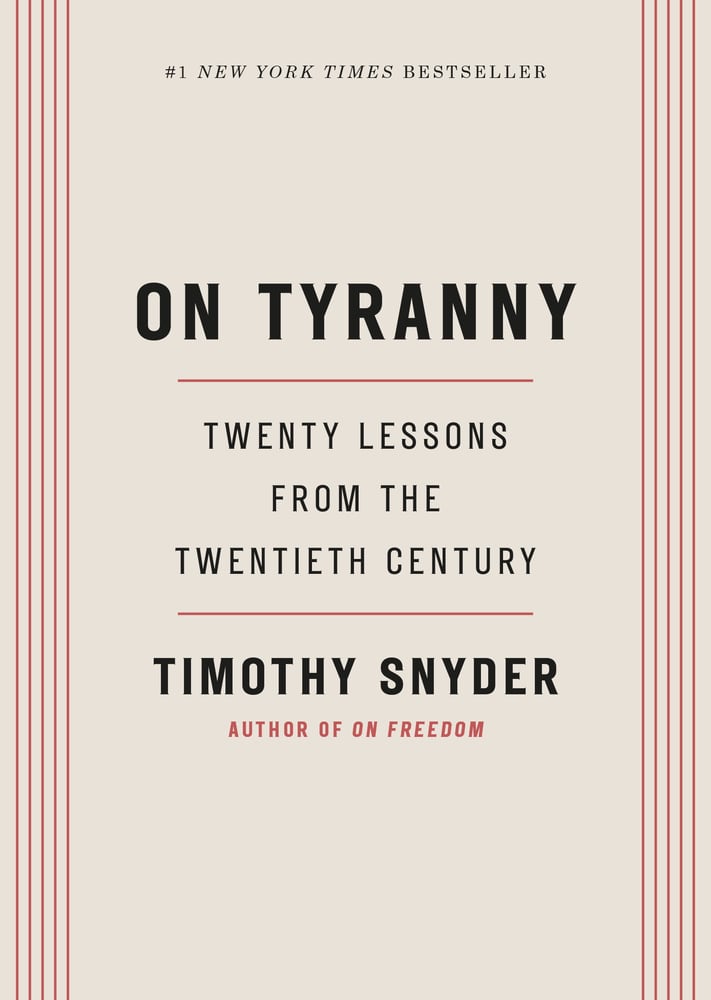 Book cover of 'On Tyranny: Twenty Lessons from the Twentieth Century' by Timothy Snyder. Black text on a sand colored background with red accent lines.