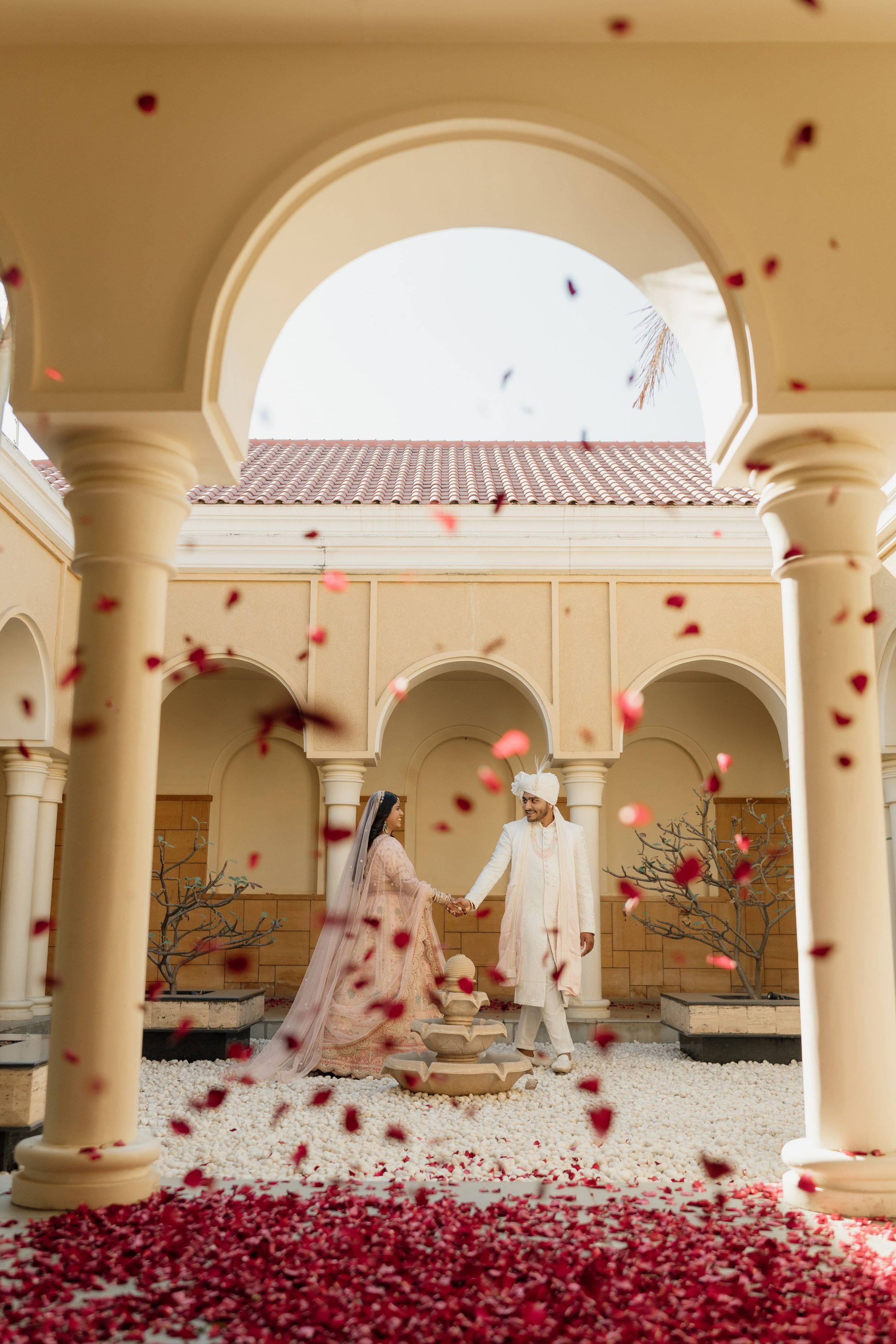 Courtyard exit through a cloud of petals