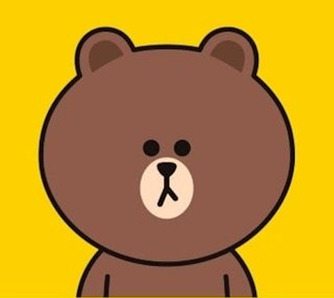 The image presents a highly stylized, flat 2D vector illustration of a bear character, characterized by its clean, bold black outlines and uniform color fills. The color palette is minimal and high-contrast, featuring a solid, vibrant yellow background that makes the warm, medium-brown tones of the bear pop; the bear's muzzle is a lighter cream color, while its eyes and nose are solid black. There is no shading, gradients, or texture rendering, resulting in a completely matte and smooth surface quality typical of digital iconography or sticker art. The composition is a simple, centered portrait with a shallow depth of field, focusing entirely on the character's head and upper torso against the flat backdrop. The shape language is composed of soft, rounded geometric forms—circular eyes, a rounded head, and semi-circular ears—creating a friendly and approachable aesthetic. The overall mood is cheerful, simple, and iconic, evoking the playful and accessible visual style commonly found in digital communication stickers and mascots.