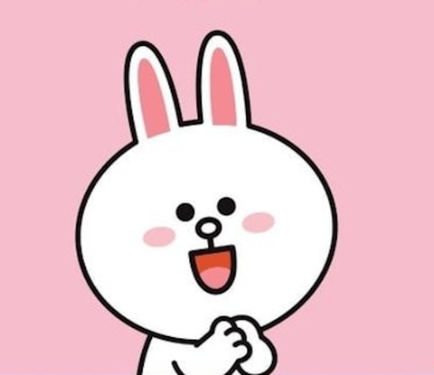 This image features a flat, 2D illustrative style with clean, consistent black outlines defining the character's form. The color palette is simple and high-contrast, dominated by a pure white rabbit character against a solid, soft pastel pink background, with accents of a slightly deeper pink for the inner ears and blush, and a warm coral-red inside the open mouth. The lighting is completely flat and ambient, with no directional shadows or highlights, contributing to a graphic, non-photorealistic feel. Textures are absent, presenting smooth, uniform color fills that suggest a digital vector or cel-shaded rendering technique. The composition is a centered, medium close-up portrait, focusing entirely on the character's expressive face and upper torso against a shallow, undefined space. The shape language is soft and organic, built from rounded, bulbous forms like the large circular head and oval eyes, with lines of uniform weight. The overall mood is cheerful, innocent, and approachable, conveyed through the character's wide, sparkling eyes, open-mouthed smile, and clasped hands, creating a lighthearted and cute atmosphere.