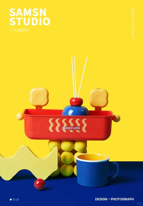 This image is a high-quality, photorealistic 3D render with a distinct pop art and Memphis-inspired aesthetic, characterized by a vibrant, high-saturation color palette dominated by primary and secondary hues—specifically bold yellow, deep cobalt blue, and bright cherry red. The lighting is crisp and directional, casting soft but defined shadows that enhance the three-dimensionality of the objects while maintaining a clean, studio-lit quality with high contrast between the vivid surfaces and the flat, solid-colored background. Textures are smooth and glossy, particularly on the ceramic-like red tray and blue mug, juxtaposed with the matte, porous finish of the yellow foam-like wave shape and the slightly textured surface of the spherical supports, creating a tactile interplay of materials. Compositionally, the arrangement is centered and balanced, using geometric forms—rounded rectangles, perfect spheres, and cylindrical shapes—to build a playful, sculptural structure that feels both organized and whimsical. The shape language is predominantly geometric with soft, rounded edges, avoiding sharp angles to maintain a friendly, approachable feel. The overall mood is energetic, cheerful, and modern, evoking a sense of playful sophistication through its bold use of color, clean lines, and stylized object arrangement.